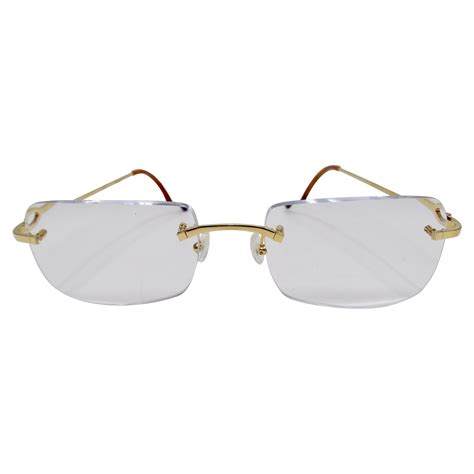 cartier rimless rectangular frame glasses.